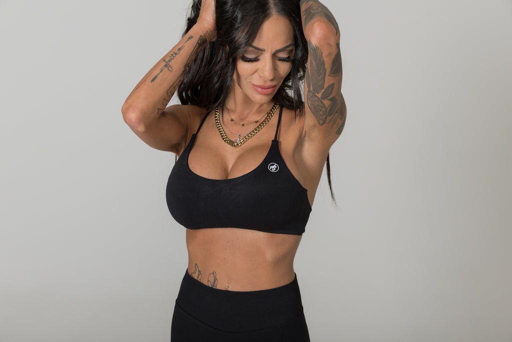 Black minimal strap sports bra women moisture wicking activewear