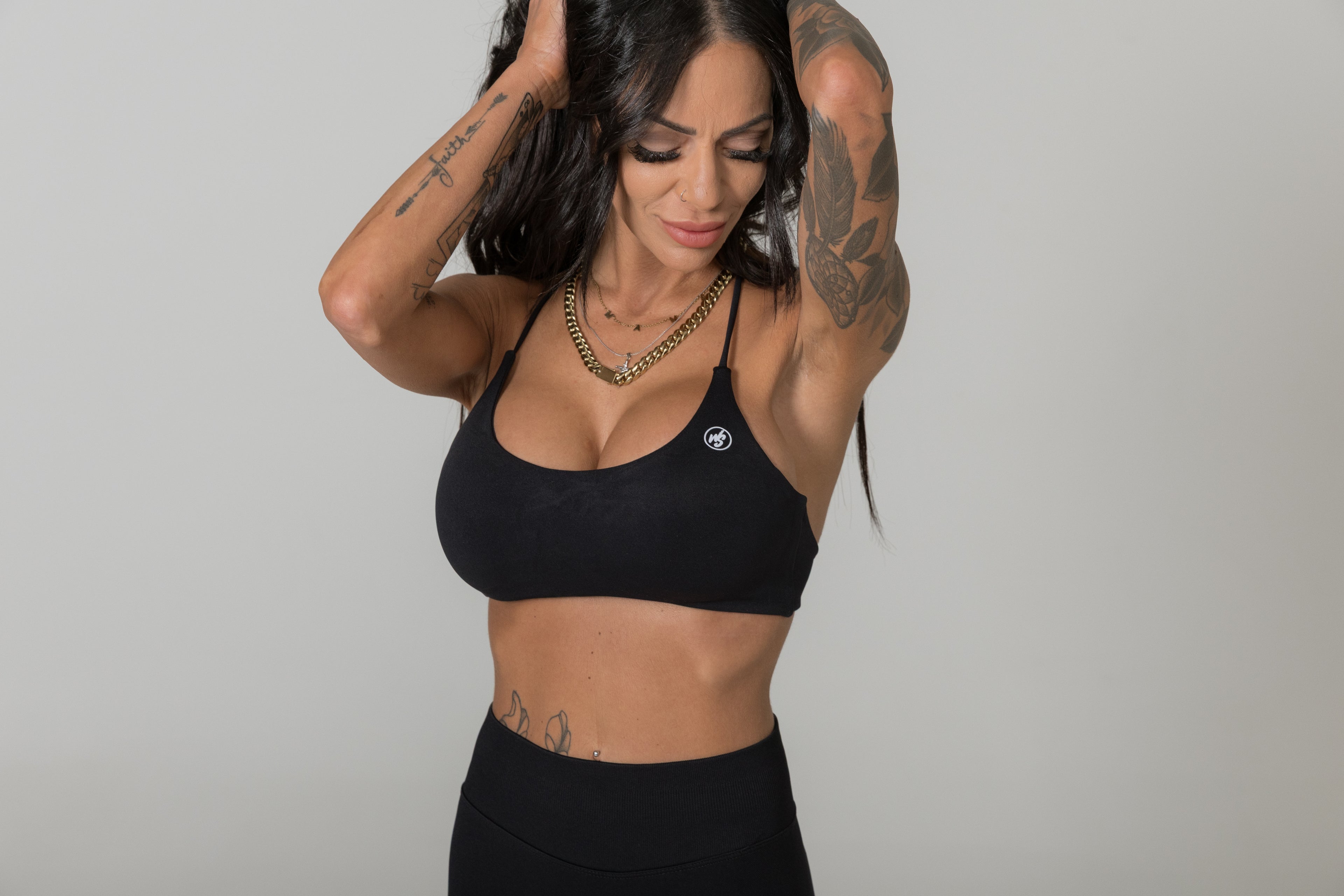 Black minimal strap sports bra women moisture wicking activewear